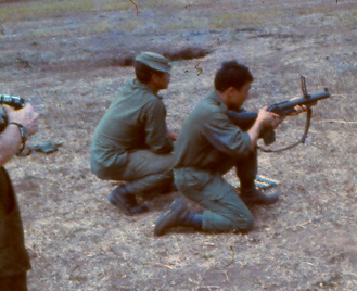 Range practice outside Nui Dat employing M79 grenade launcher, Lcpl Craig Cocker on left [King]