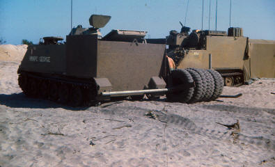 Inside NDP TIMOTHY - modiified MCT APC with boom and loose tyres, the APC was driven at best speed through the minefield to explode mines - lots of extra armour added to chassis [Young]