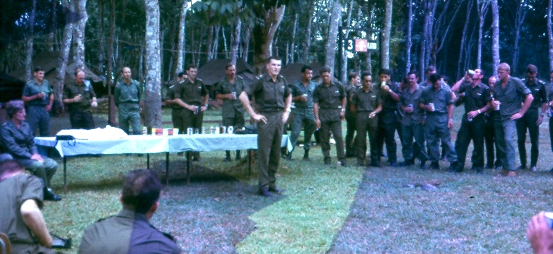 Maj Torrance addressing company & guests, final BBQ in Nui Dat Nov 70. Guests are wearing JG uniforms, W3 personnel are in dark green dacron uniforms with lanyard & medal ribbons [Ure]