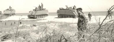 APC on the beach after the AV-10 Broncho had departed