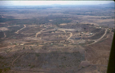 extinct volcano with collapsed wall at south end gave the feature the 'horseshoe' name.  Dark plantation top left is Nui Dat [Young]