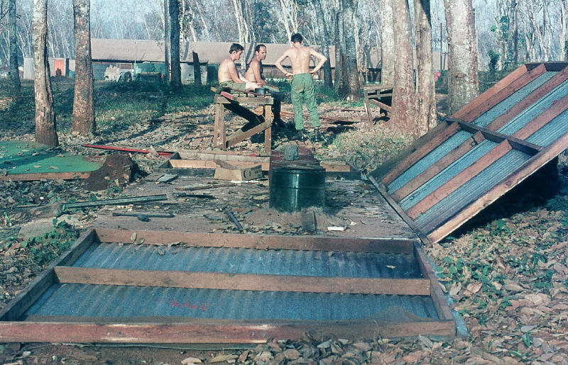 long drop toilet being demolished and replaced [Stock]