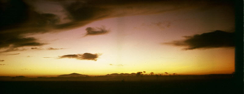 "At the going down of the sun, and in the morning, we will remember them...!'  sunset over Phouc Thuy province Vietnam 1970 [Stock]